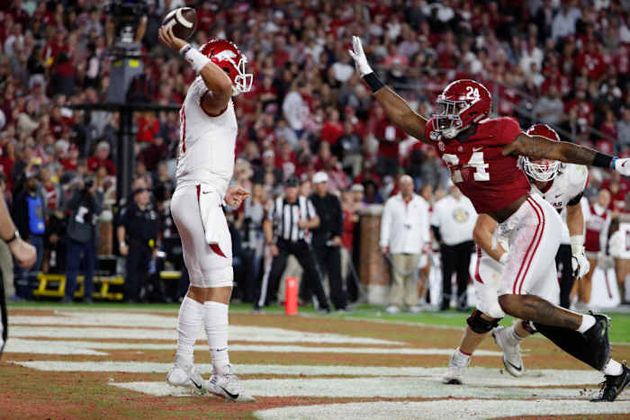 Arkansas quarterback Nick Starkel had Alabama linebacker Terrell Lewis in his face all night long.